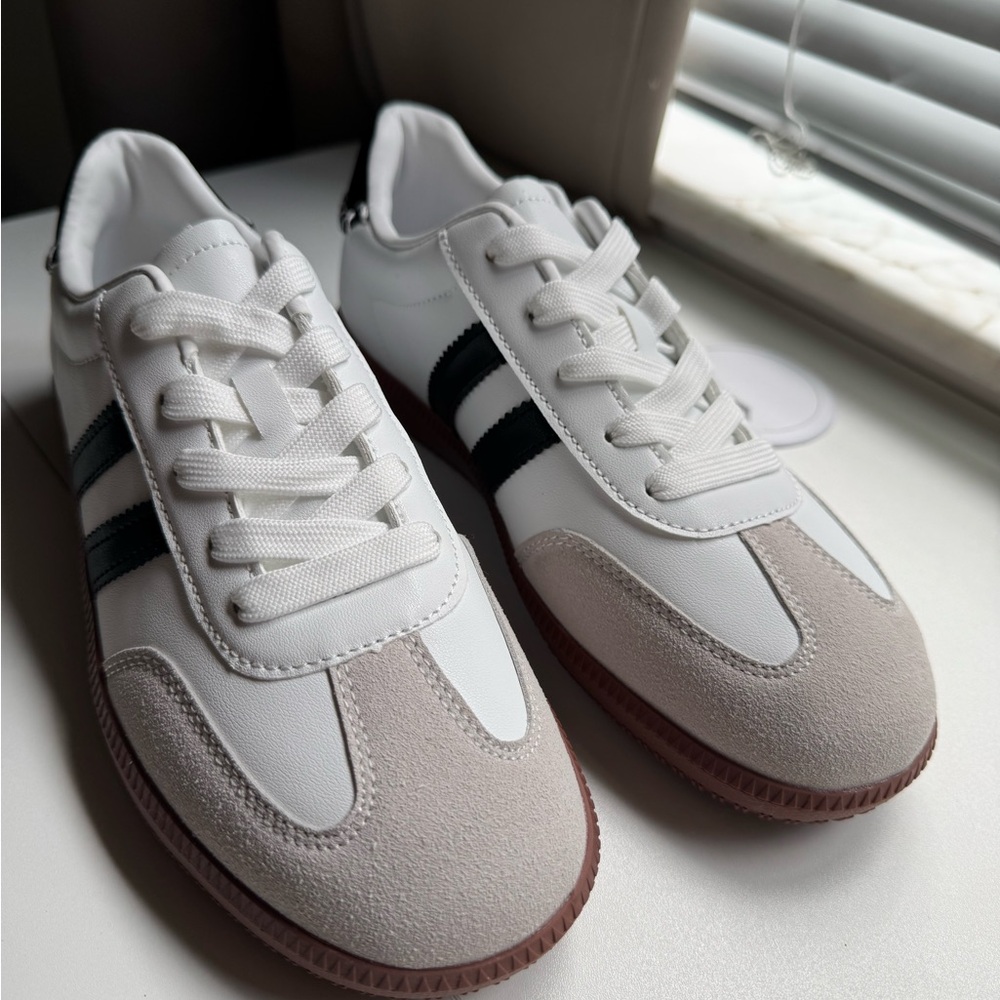 Stylish White and Black Sneakers